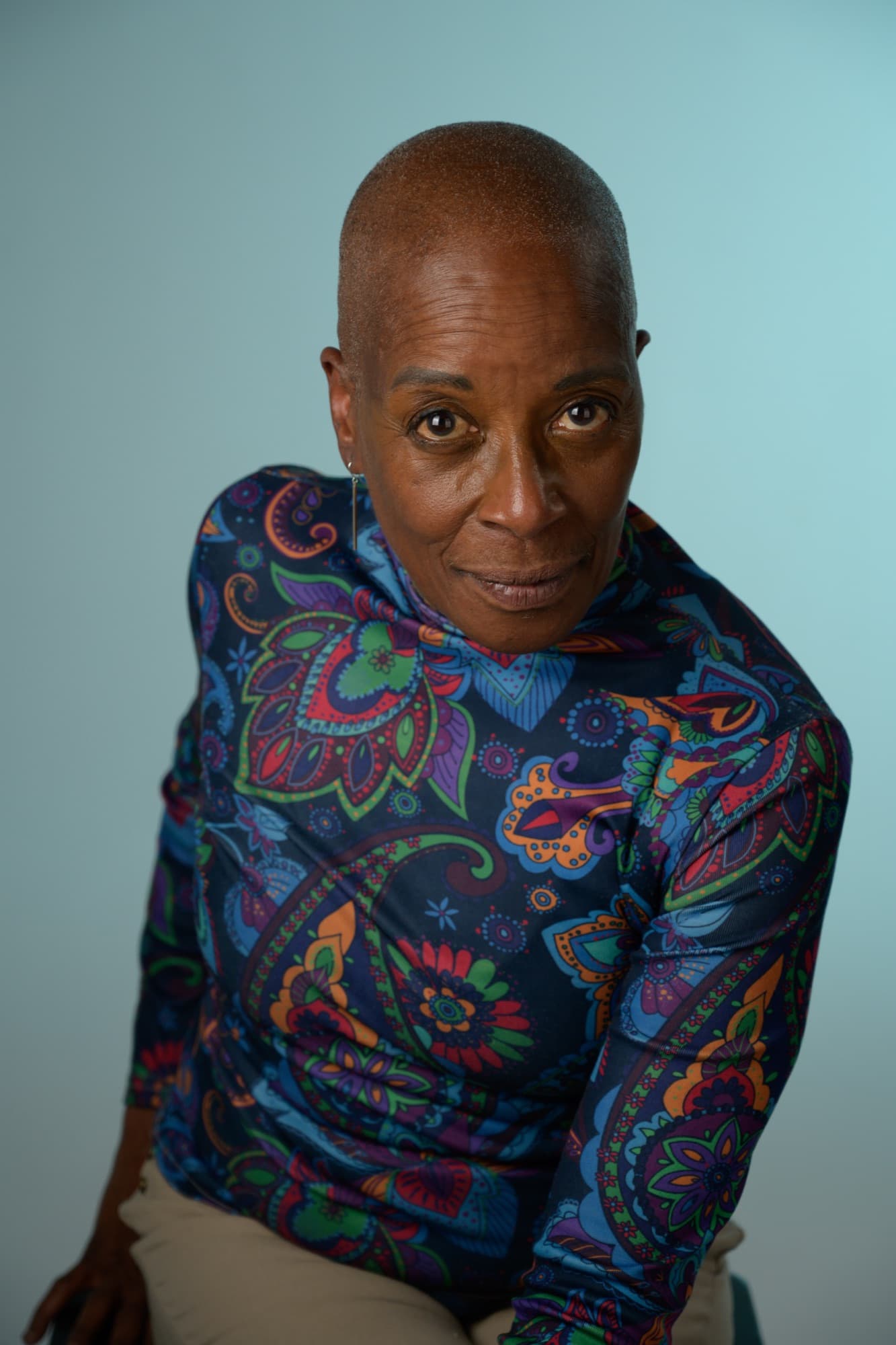 Portrait of Rhonda Moore in a paisley top.